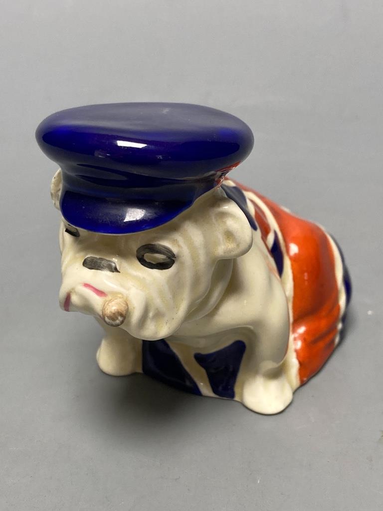 After Charles Noke, a Royal Douton Union Jack British Bulldog, height 7cm